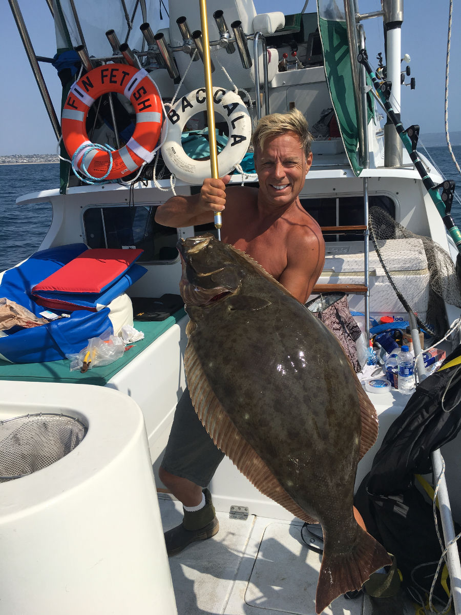 Capt Brian with a California halibut caught near Los Angeles